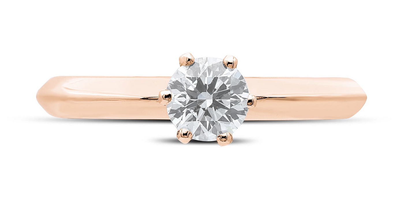 Bague solitaire en diamant et or rose 18k Distinguée, ornée d'un diamant brillant rond.