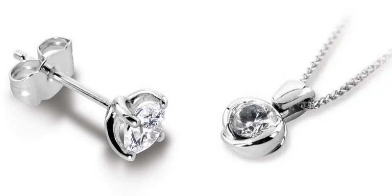 Boucle d'oreille et pendentif en platine et diamant