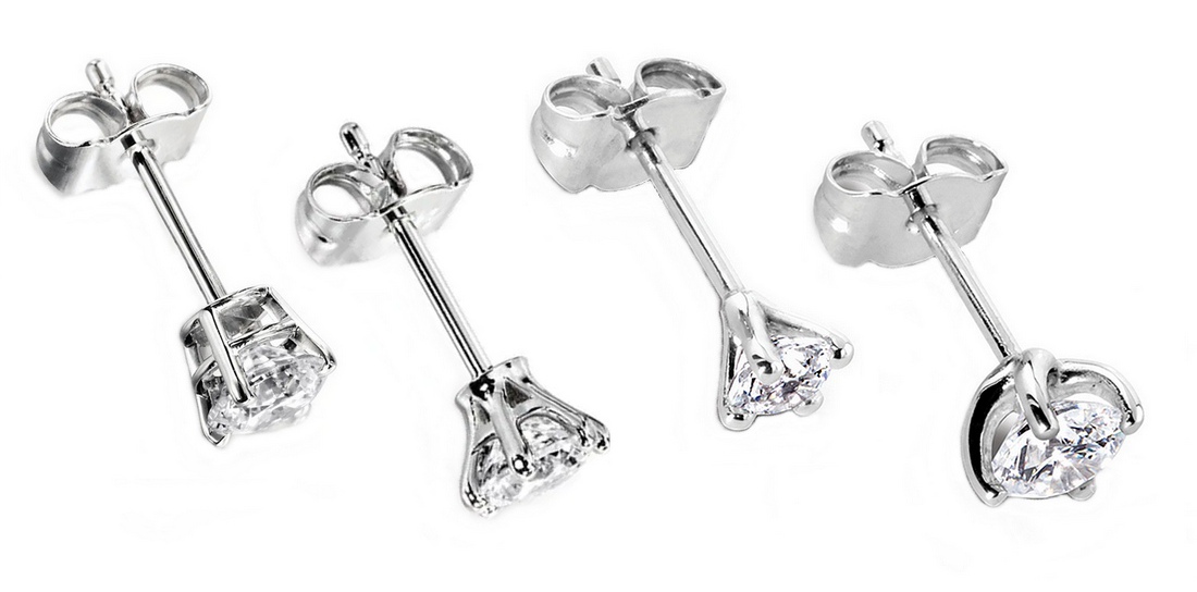 Différents modèles de boucles d'oreilles en diamant et or blanc