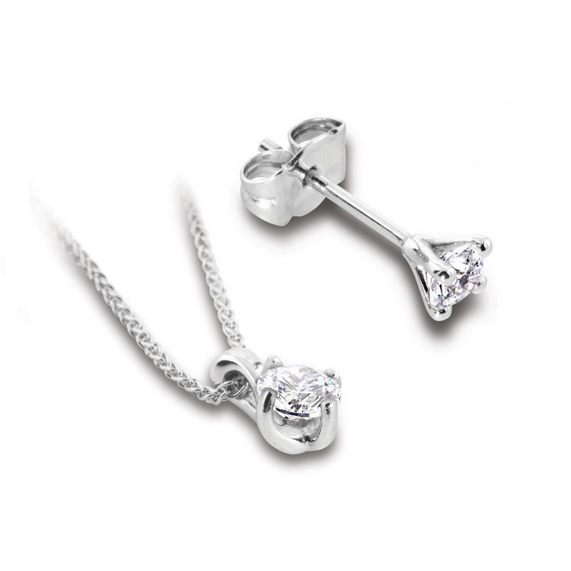 Parure en diamant et or blanc composée de boucles d'oreilles et d'un pendentif "Classique"